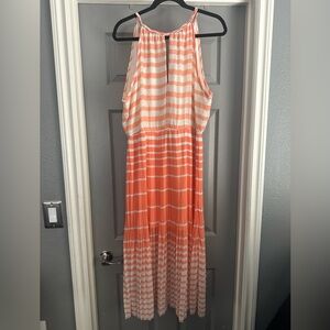 Midi pleated dress with tie back neck.